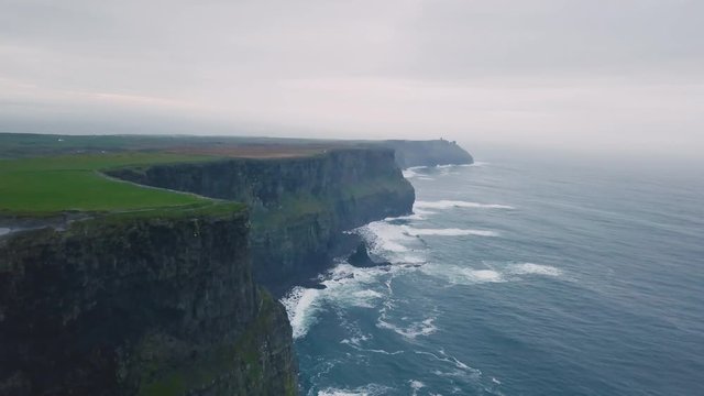 Awesome stones view cliffs of moher taking video with the drone from the air , in the evening.