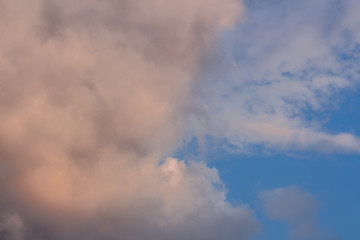 Bright orange sky at sunset. Pink clouds in the sun at dawn.