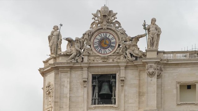 Bells ring in the San Pietro Papal Basilica belfry in Vatican during Pope preach on Holy Sunday