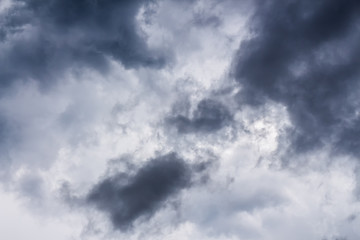 Terrible cloudy sky. Gray rainy clouds. A storm warning.