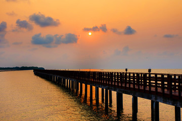 Obraz premium Long Bridge at sea view on morning seascape sunrise background