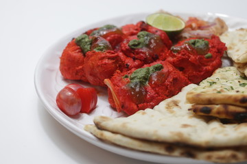 Indian Food, Chicken Tandoori topped with Mint Sauce , Served with Nan