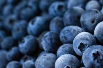 Close up fresh blueberries grouped macro background