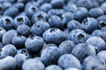 Close up fresh blueberries grouped macro background