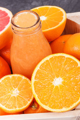 Freshly blended coctail from citrus fruits as source minerals. Slimming, diet and healthy nutrition concept