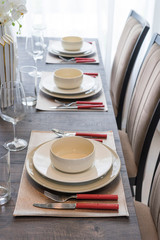 luxury plate setting on dinning table