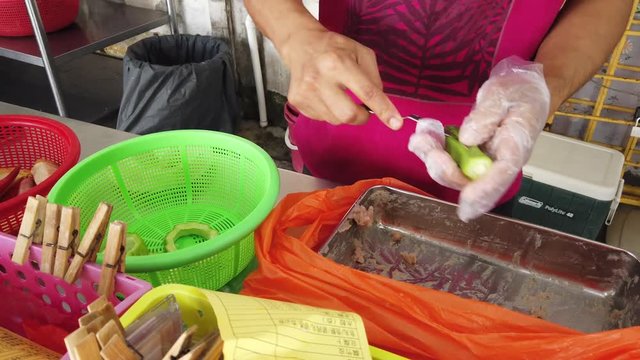 Ampang yong tau foo is a Hakka Chinese food consist of tofu eggplant chilli ladies finger okra filled with either a ground meat mixture or fish paste and deep fried and served with sweet bean sauce
