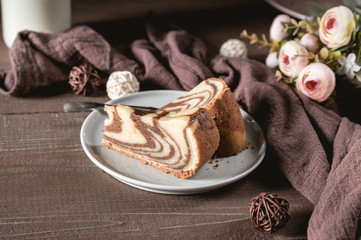 Chocolate and vanilla cake with milk