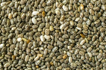 A close up macro wallpaper background image of chia seeds