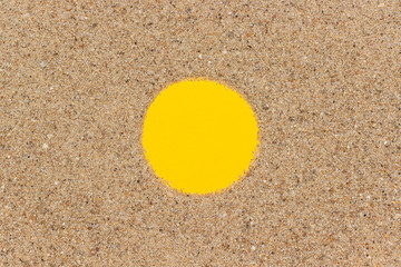 Yellow circle frame shape and sea sand. Template mockup for your design