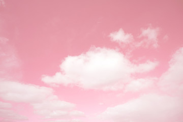 Abstract unreal pink sky and cumulus clouds