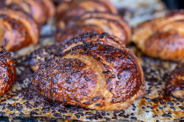 Fresh chocolate croissant with chocolate sprinkles for sale at Jerusalem local bakery store