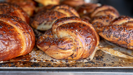 Fresh croissant with chocolate sprinkles for sale at Jerusalem local bakery store