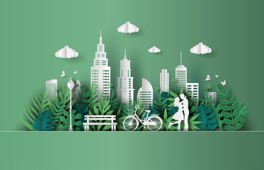 Paper art and craft style of cute couple in love hugging, eco green city, save the planet and energy concept, flat-style vector illustration.