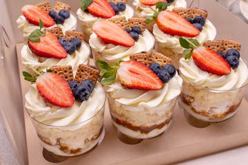 cupcakes with berries and cream