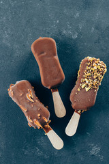 Summer Food Background. Eskimo ice cream in chocolate glaze. Yummy sweet food snack treat. Top...