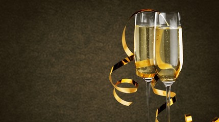 Close up Champagne bubbles in glass on black background