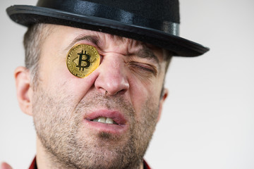 Man having bitcoin in eye