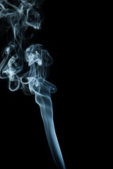 Blue smoke on black background