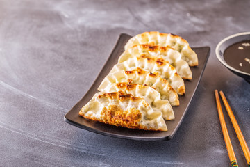 gyoza or dumplings snack with soy sauce