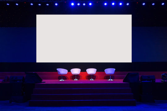 Chairs On Stage In Conference Hall  At Business Event Or Seminar Meeting, Business And Education Concept