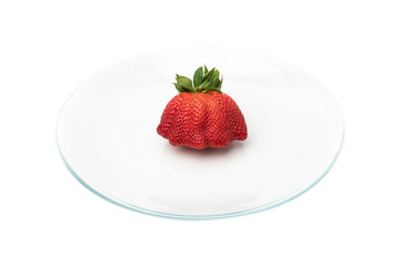 Strawberry in a bowl on a white background