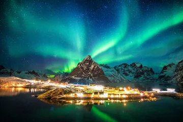 Foto op Plexiglas Aurora borealis over mountains in fishing village © Mumemories