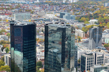 Fototapeta na wymiar Panoramic view from observation point from Main Tower to Frankfurt and suburbans, Germany 