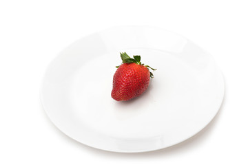Strawberry in a bowl on a white background