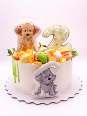Cake for 2 years decorated with dog-shaped cookies