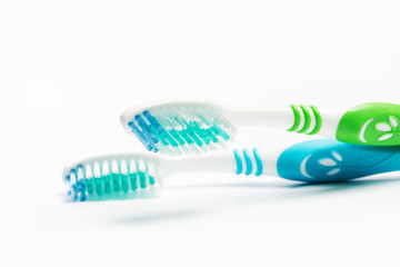 New different  toothbrushes on a white background