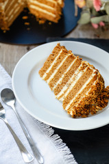 Homemade honey cake (medovik) with sour cream.