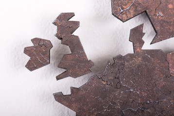 Roughly outlined world map, selective focus on the United Kingdom