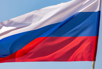 Flag of Russia against the blue sky