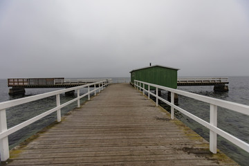 Obraz premium winter pier on the sea