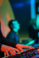Speech by musicians on stage. Hands and musical instrument closeup. 