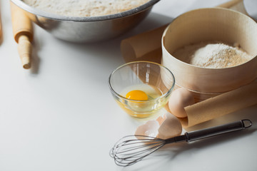 Bread dough rising in a bowl after proofing