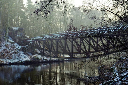 Bridge in the forest over the Gwda River in Poland. Build in 1914, destroyed at the end of World War 2 by German army.