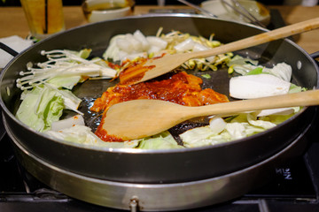 Dakgalbi is Korean famous food Sliced chicken into pieces Mash with ingredients and marinate until When eaten, will be stir-fried with vegetables on a giant pan
