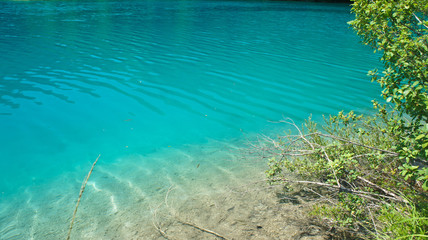Fototapeta na wymiar Crystal water, Plitvice Lakes in Croatia, National Park, sunny day