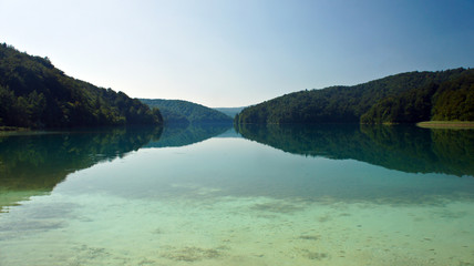 Crystal water and landscape with hills, Plitvice Lakes in Croatia, National Park