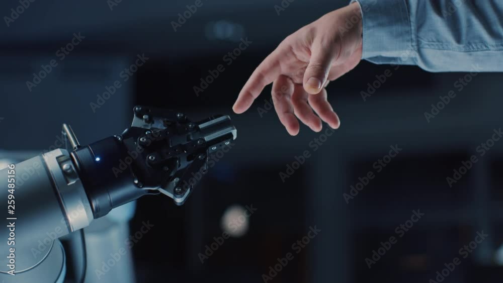 Poster futuristic robot arm touches human hand in humanity and artificial intelligence unifying gesture. co