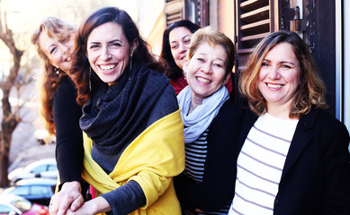 Women best friends smiling, drinking morning coffee