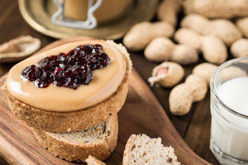 Homemade Healthy Breakfast. Peanut Butter and Jelly on Rustic Wooden Background.