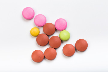set of multi-colored tablets  on a white background