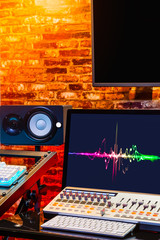 colourful waveform on display in loft interior design digital sound studio for modern home...