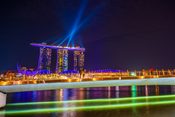 Fototapeta na wymiar Spectra Light and Water Show Marina Bay Sand Casino Hotel Downtown Singapore