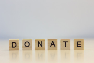 The word Donate on cubes