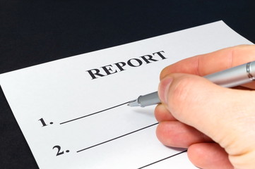 We are preparing a report - a form to fill in on a black table.