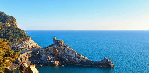 San Pietro church with sea horizon in background, Lord Byron Natural park in Portovenere village on...